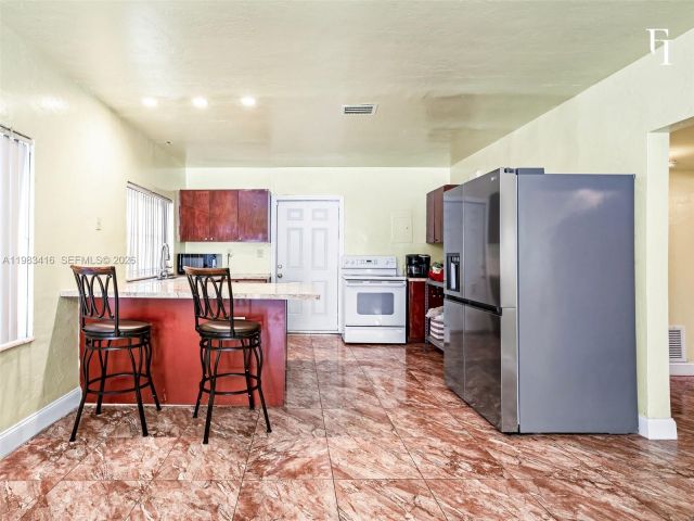 Home for sale at 1195 NW 48th St - photo 7531475