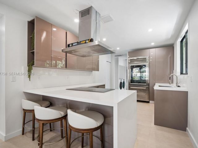 Home for rent at 5661 Pine Tree Dr 0 - photo 7526496