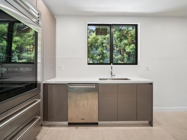 Home for rent at 5661 Pine Tree Dr 0 - photo 7526499