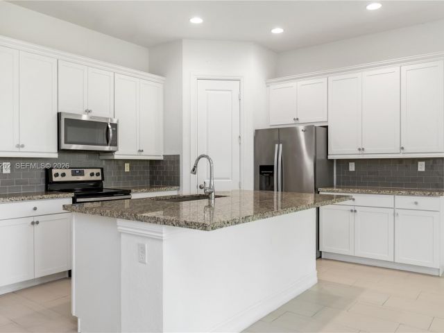 Home for rent at 11524 SW 16th St - photo 7528815