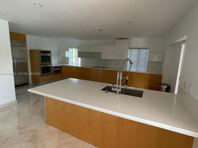 Home for rent at 3406 NE 168th St 3406 - photo 7531193