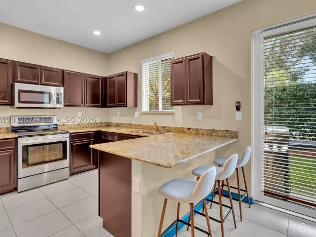 3-bedroom home for sale in Miami Gardens - 1410 NW 214th Ter - MondialRealty