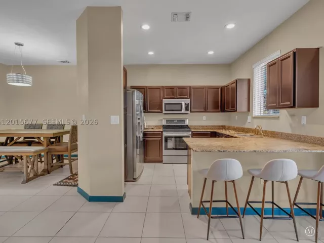 3-bedroom home for sale in Miami Gardens - 1410 NW 214th Ter - MondialRealty