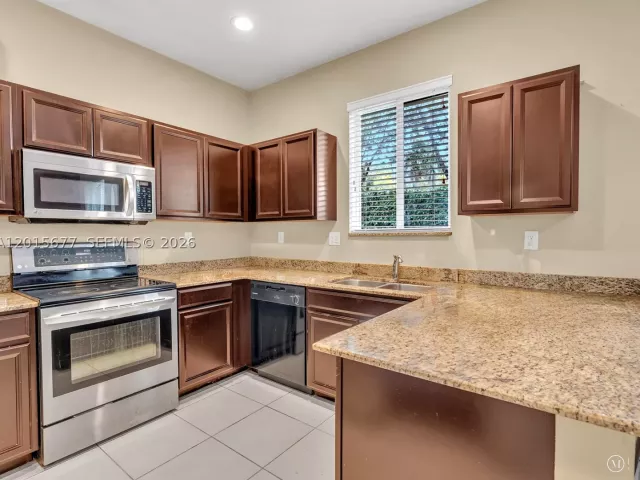 3-bedroom home for sale in Miami Gardens - 1410 NW 214th Ter - MondialRealty