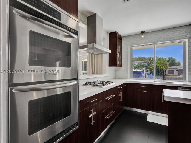 4-bedroom home for rent in North Miami - 1912 NE 119th Rd 0 - MondialRealty