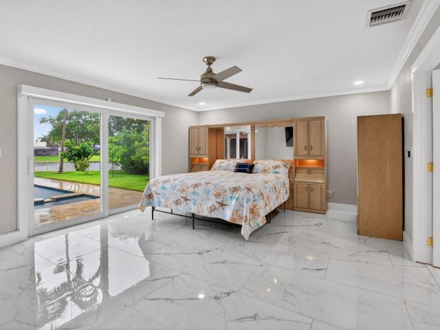 3-bedroom home for sale in Deerfield Beach - 2378 Deer Creek Lob Lolly Lane - MondialRealty