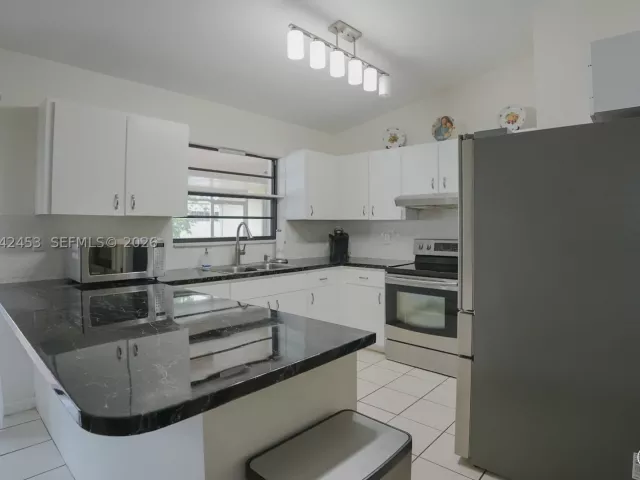 3-bedroom home for sale in Miami - 10920 SW 143rd Ct - MondialRealty