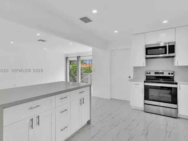 4-bedroom home for rent in Surfside - 8858 Harding Ave - MondialRealty