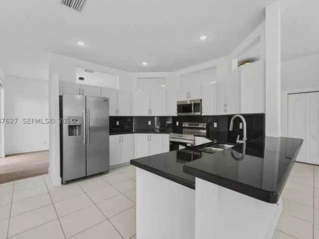 4-bedroom home for sale in Boca Raton - 9535 Fox Trot Ln - MondialRealty