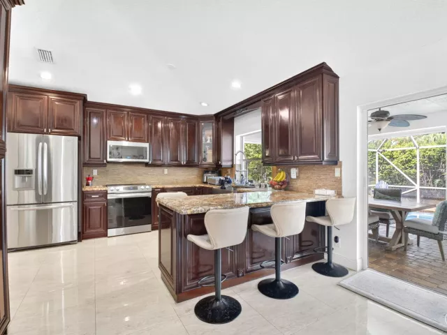 4-bedroom home for sale in Boca Raton - 19505 SEDGEFIELD Terrace - MondialRealty