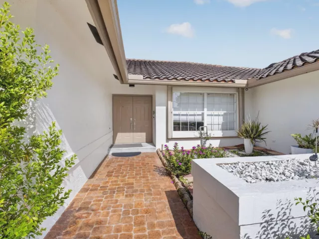 4-bedroom home for sale in Boca Raton - 19505 SEDGEFIELD Terrace - MondialRealty