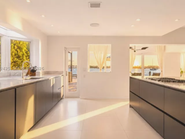 6-bedroom home for sale in Miami - 1300 S Venetian Way - MondialRealty