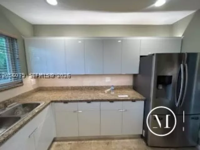 3-bedroom home for rent in Surfside - 409 91st St - MondialRealty