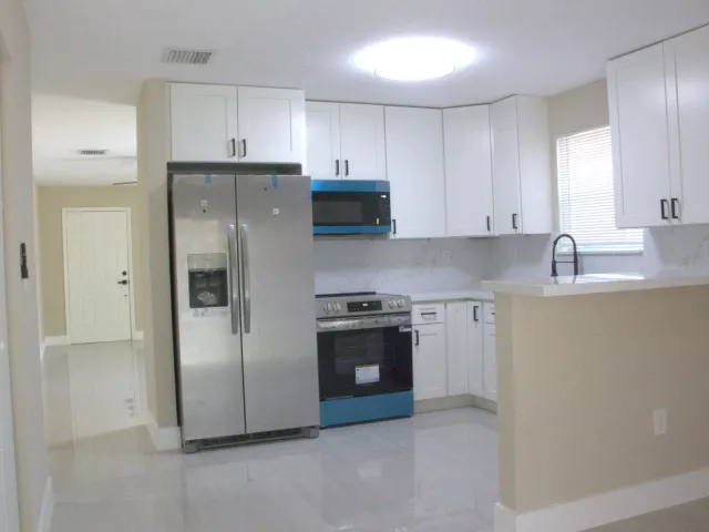4-bedroom home for sale in Miami Gardens - 1724 NW 152ND Terrace - MondialRealty