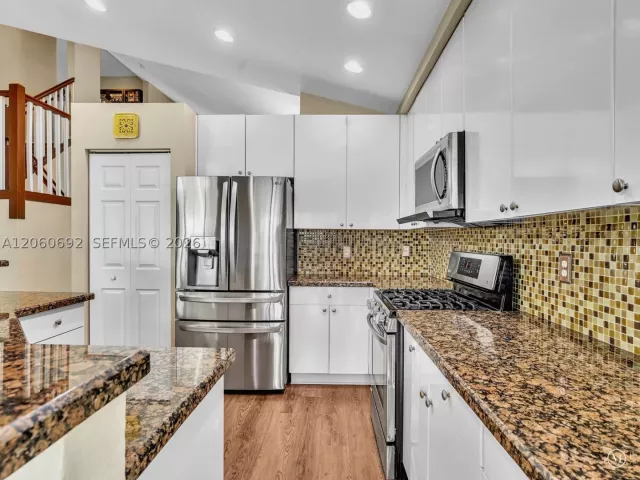 4-bedroom home for sale in Pembroke Pines - 1208 NW 144th Ter - MondialRealty