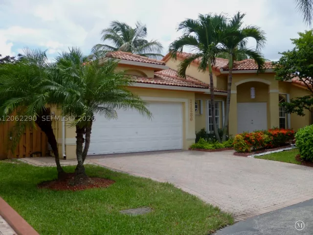 4-bedroom home for rent in Doral - 11236 NW 58th Ter - MondialRealty