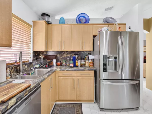 3-bedroom home for sale in Delray Beach - 13620 Weyburne Drive - MondialRealty