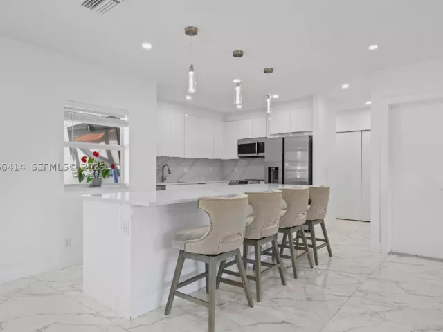 4-bedroom home for rent in Boca Raton - 669 NW 15th Ave 0 - MondialRealty