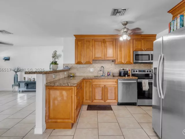 4-bedroom home for sale in Pompano Beach - 2721 NE 8th Ave - MondialRealty