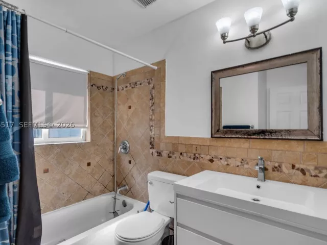 4-bedroom home for sale in Pompano Beach - 2721 NE 8th Ave - MondialRealty