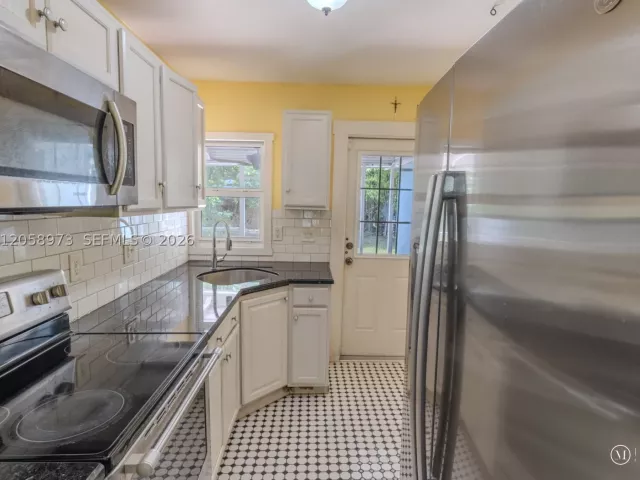 4-bedroom home for sale in North Miami - 520 NE 129th St - MondialRealty