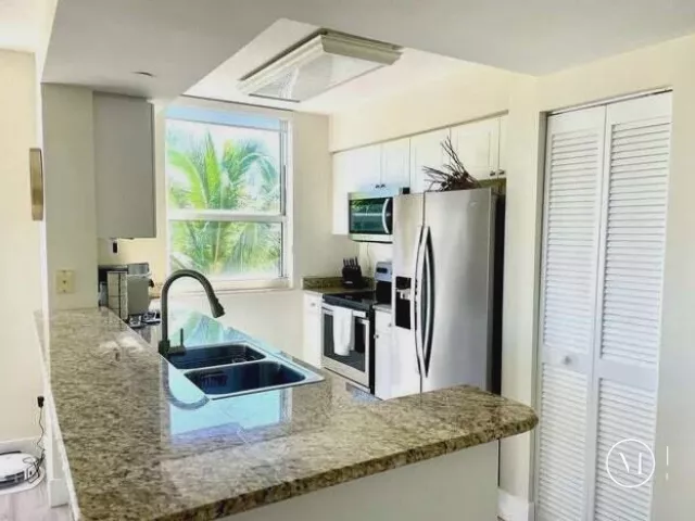 2-bedroom condo for rent in Aventura - 19501 W Country Club Drive 414 - MondialRealty