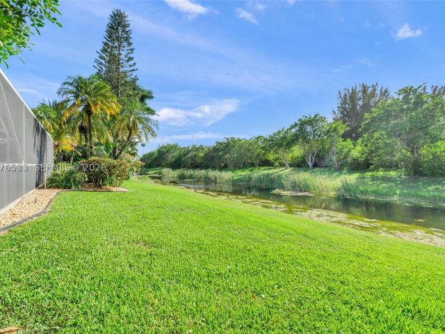4-bedroom home for sale in Boca Raton - 11834 Island Lakes Ln - MondialRealty