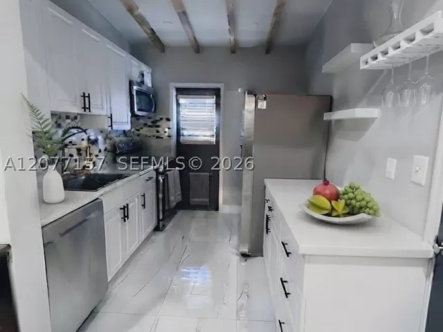 4-bedroom home for sale in Miami - 6060 NW 7th St - MondialRealty