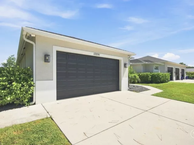 4-bedroom home for sale in West Palm Beach - 12291 70th Place N - MondialRealty