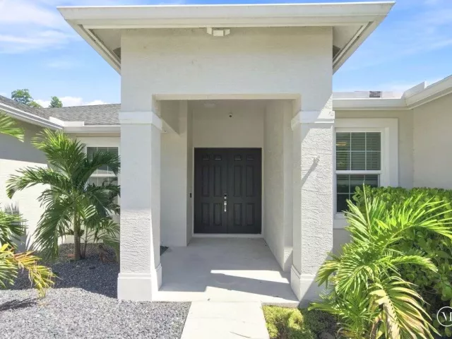 4-bedroom home for sale in West Palm Beach - 12291 70th Place N - MondialRealty