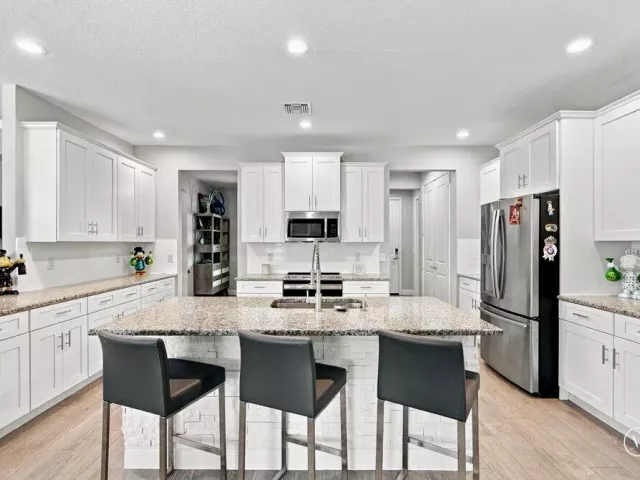 4-bedroom home for sale in West Palm Beach - 12291 70th Place N - MondialRealty