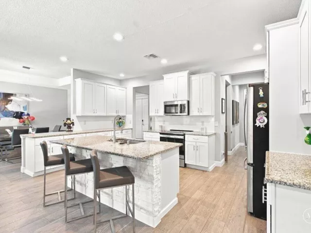 4-bedroom home for sale in West Palm Beach - 12291 70th Place N - MondialRealty