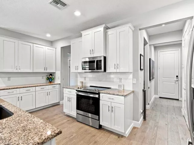 4-bedroom home for sale in West Palm Beach - 12291 70th Place N - MondialRealty