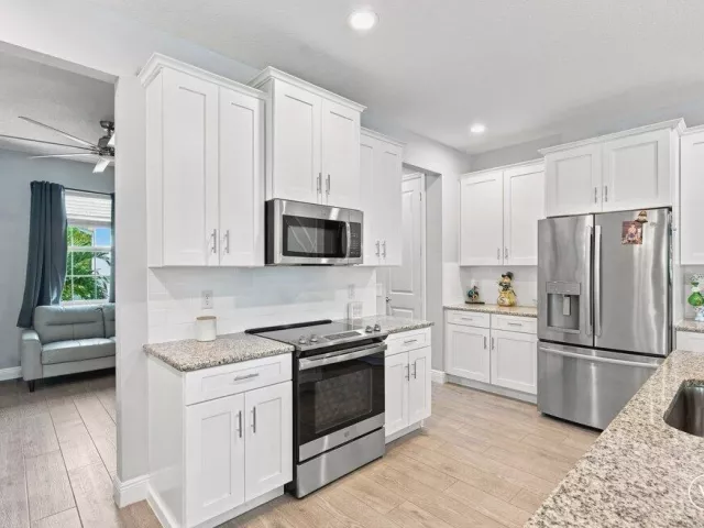4-bedroom home for sale in West Palm Beach - 12291 70th Place N - MondialRealty
