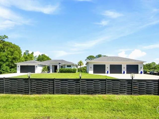 4-bedroom home for sale in West Palm Beach - 12291 70th Place N - MondialRealty