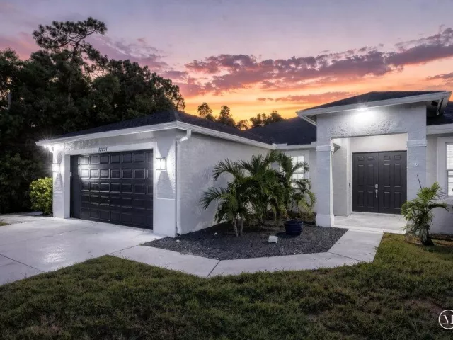 4-bedroom home for sale in West Palm Beach - 12291 70th Place N - MondialRealty
