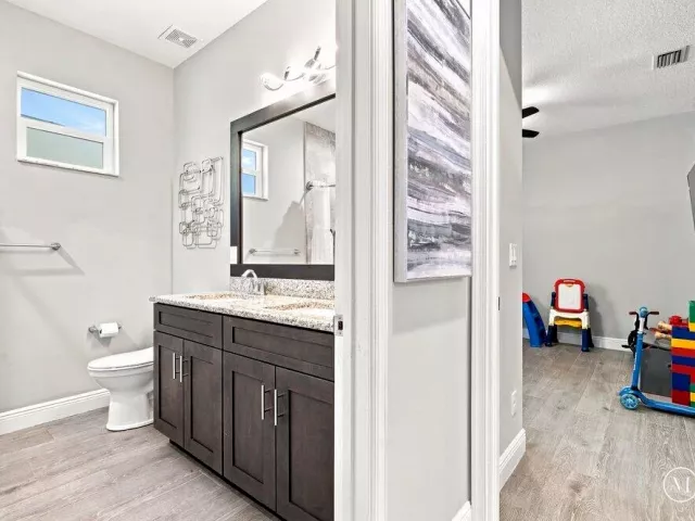 4-bedroom home for sale in West Palm Beach - 12291 70th Place N - MondialRealty