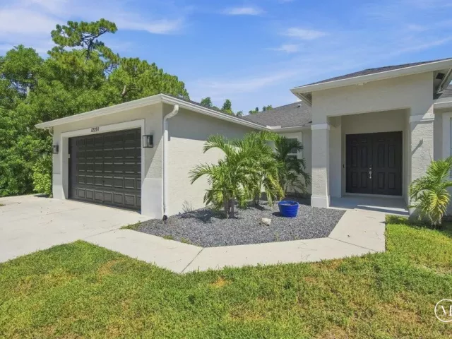 4-bedroom home for sale in West Palm Beach - 12291 70th Place N - MondialRealty