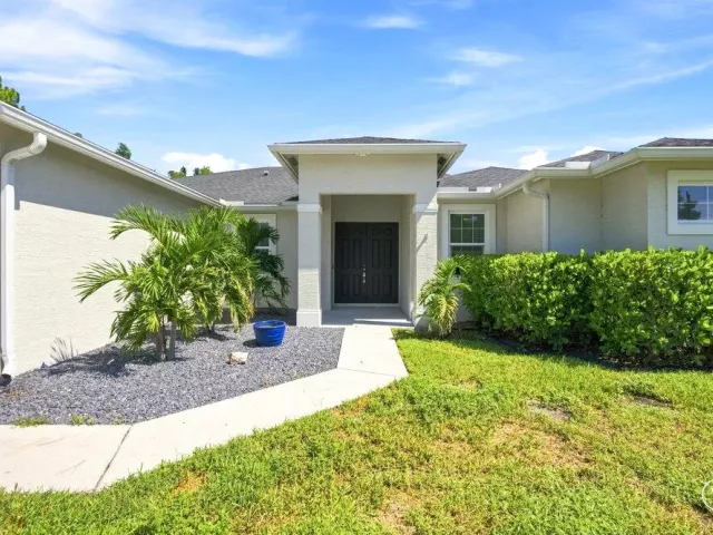 4-bedroom home for sale in West Palm Beach - 12291 70th Place N - MondialRealty