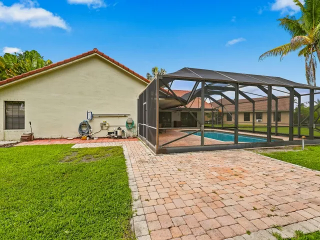 4-bedroom home for rent in Boca Raton - 10798 CYPRESS BEND Drive - MondialRealty