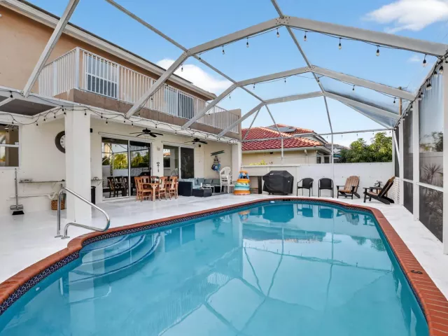 4-bedroom home for sale in Boca Raton - 18280 Coral Isles Drive - MondialRealty
