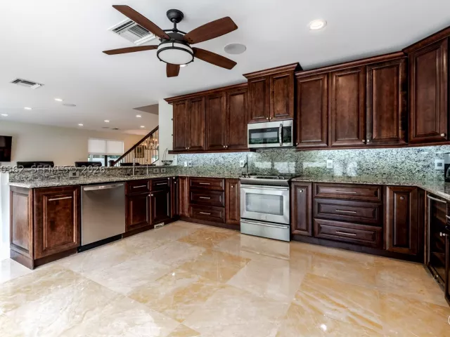 6-bedroom home for rent in Boca Raton - 169 SE Wavecrest Way 0 - MondialRealty