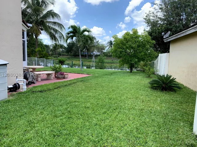4-bedroom home for sale in Pembroke Pines - 19409 NW 24th Pl - MondialRealty