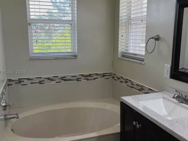 4-bedroom home for sale in Pembroke Pines - 19409 NW 24th Pl - MondialRealty
