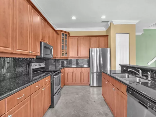 5-bedroom home for sale in West Palm Beach - 9345 Madewood Ct - MondialRealty