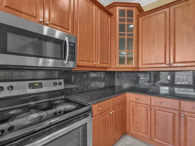 5-bedroom home for sale in West Palm Beach - 9345 Madewood Ct - MondialRealty