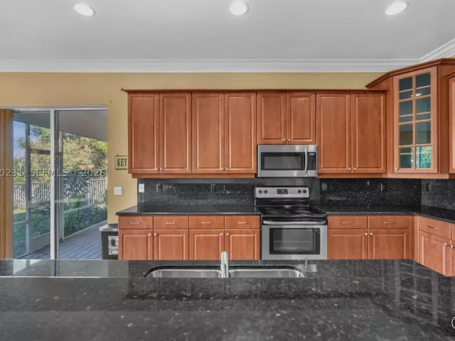 5-bedroom home for sale in West Palm Beach - 9345 Madewood Ct - MondialRealty