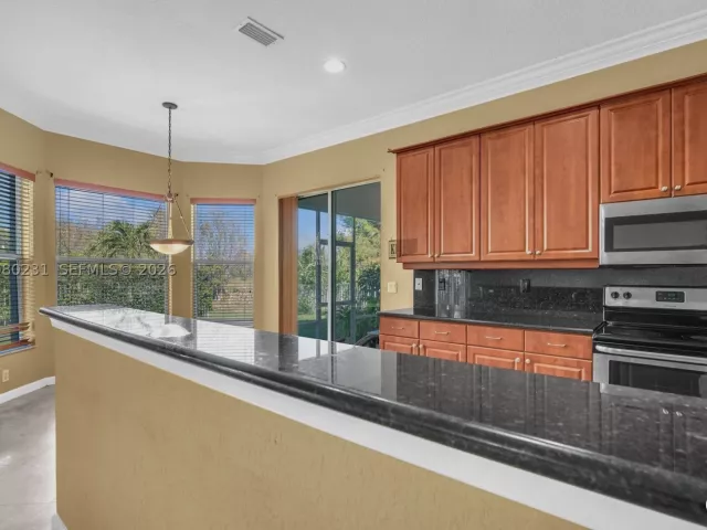 5-bedroom home for sale in West Palm Beach - 9345 Madewood Ct - MondialRealty