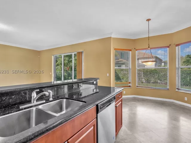 5-bedroom home for sale in West Palm Beach - 9345 Madewood Ct - MondialRealty