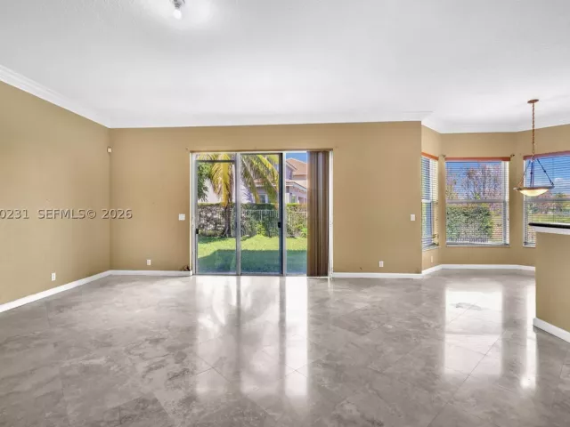 5-bedroom home for sale in West Palm Beach - 9345 Madewood Ct - MondialRealty